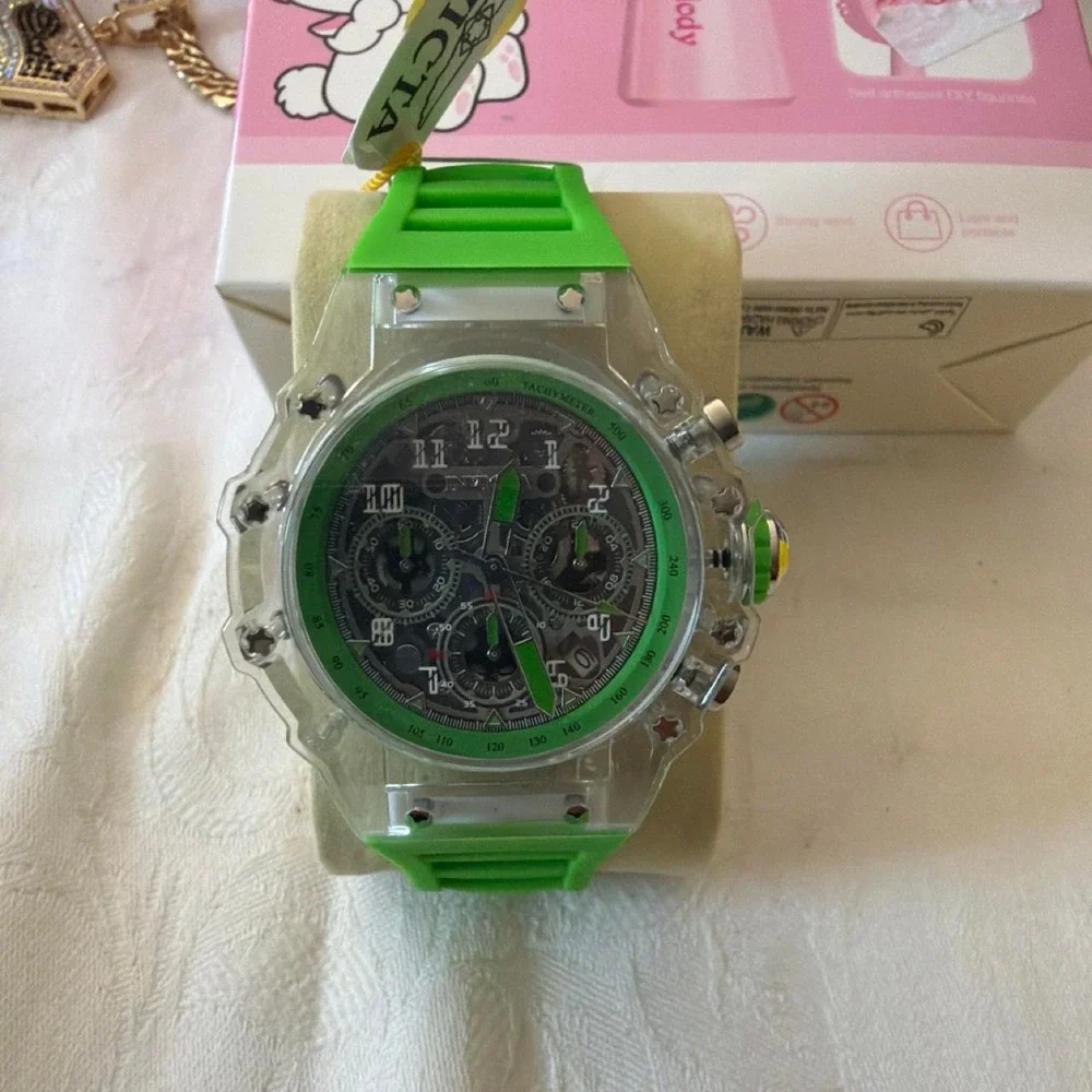 Invicta blue watch with white stripes on the band Blue, Red, yellow, Green